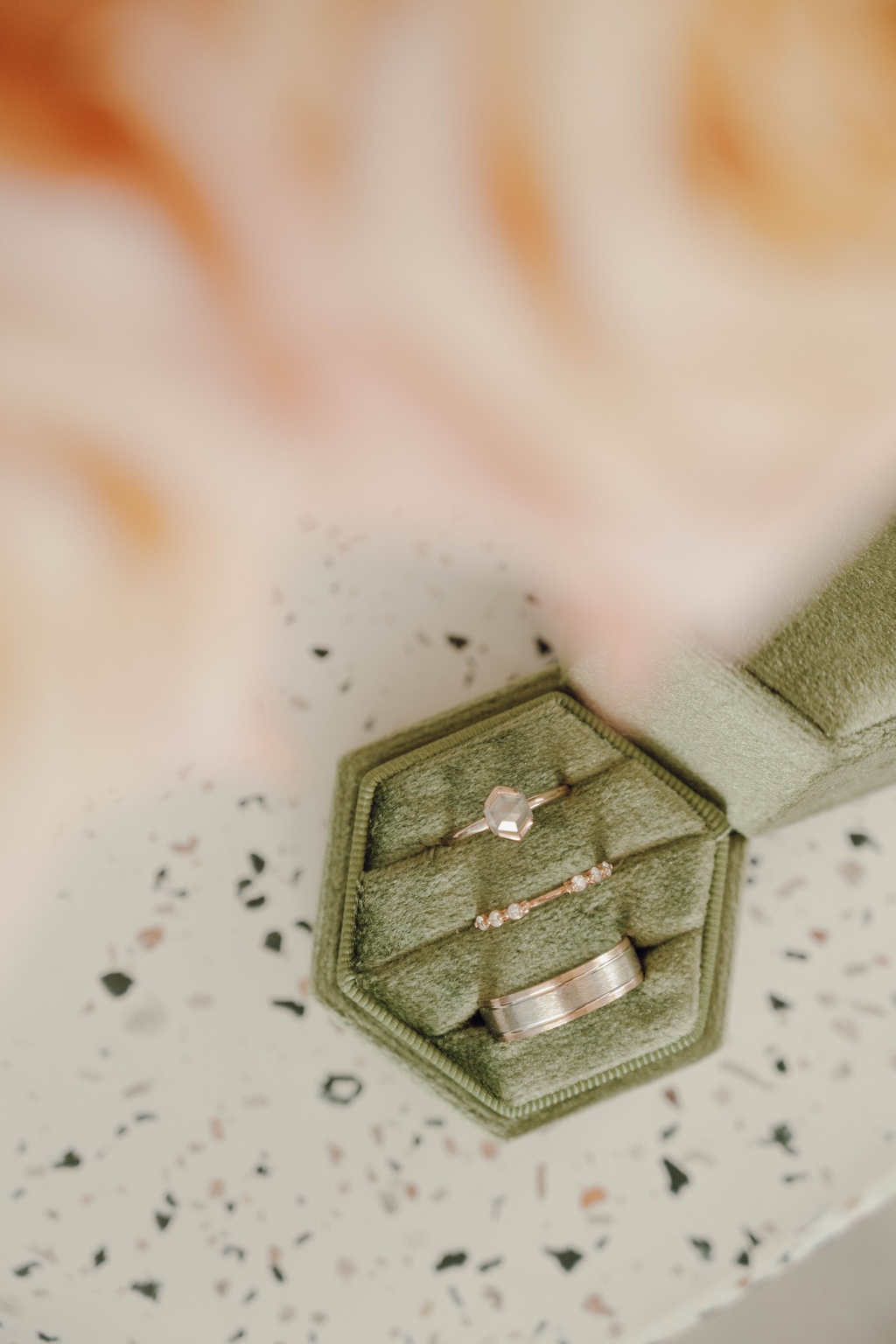 Wedding rings in a soft green velvet box
