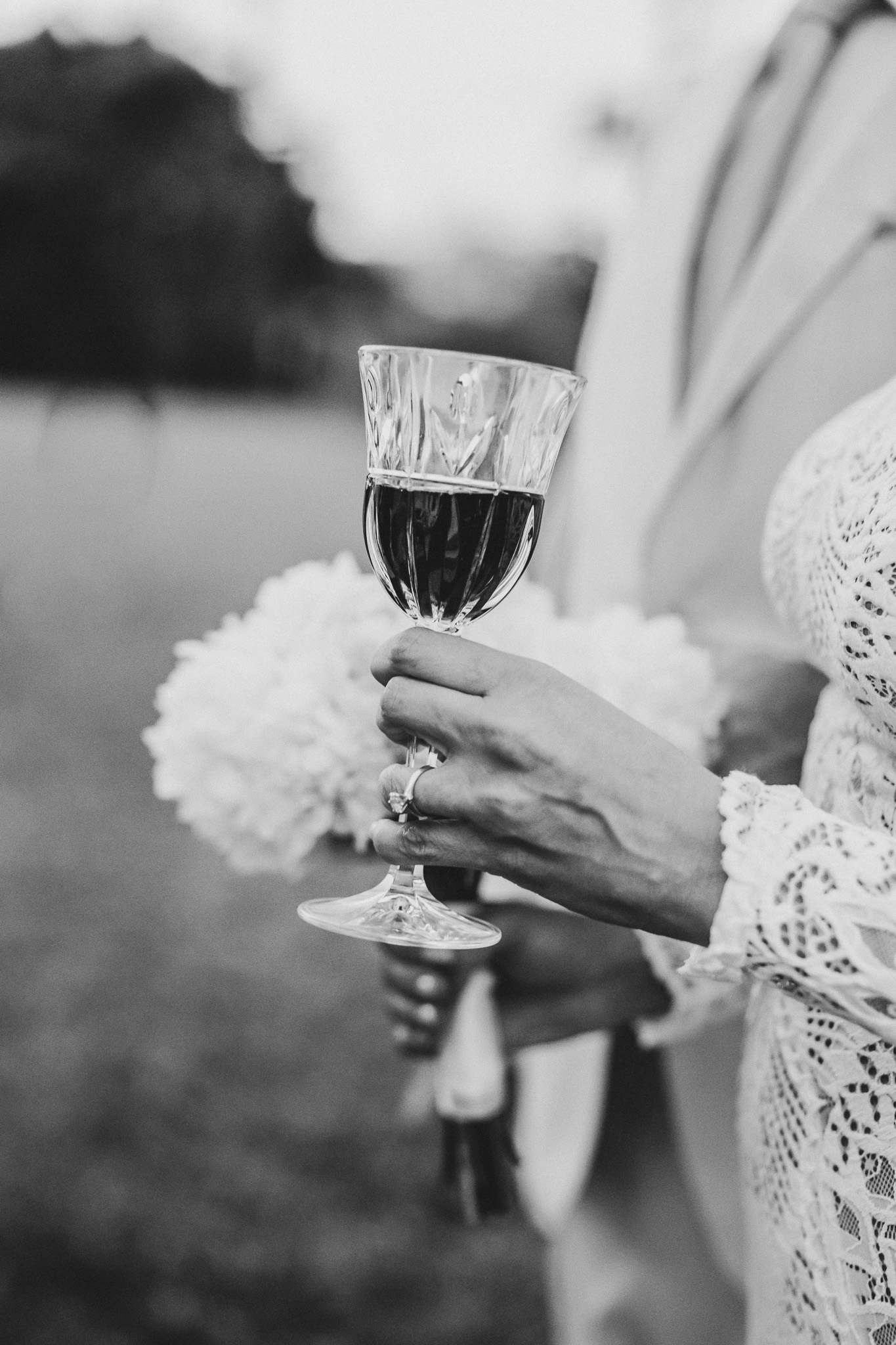 Bride holding a crystal glass during the ceremony