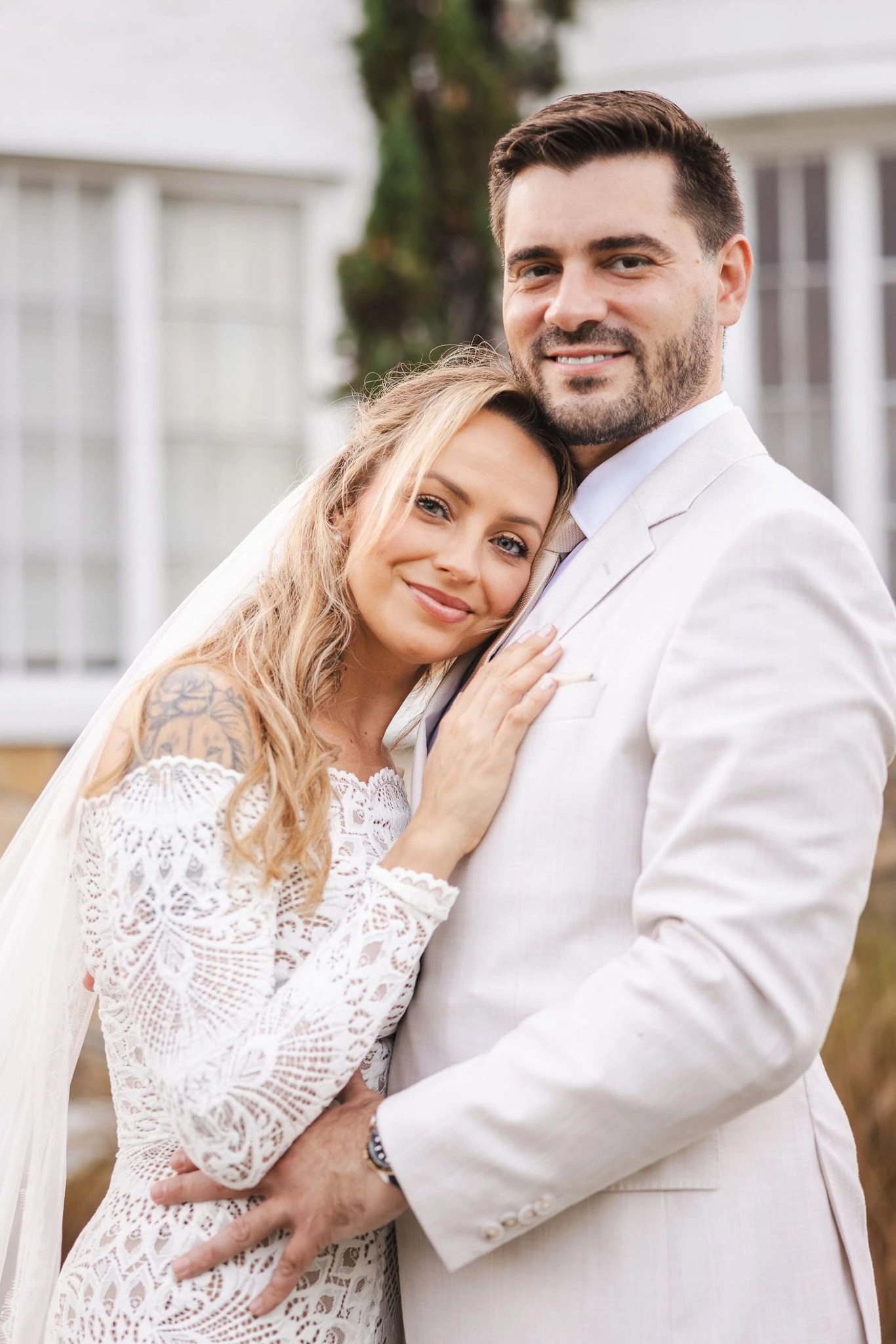 Soft coastal portrait of a newlywed couple